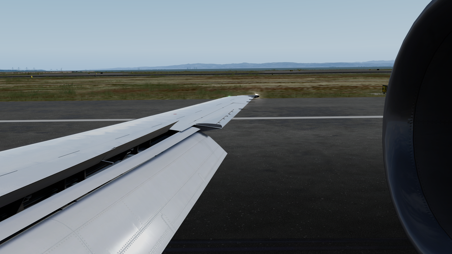 A screenshot taken from the wing of the aircraft, with the spoilers deployed